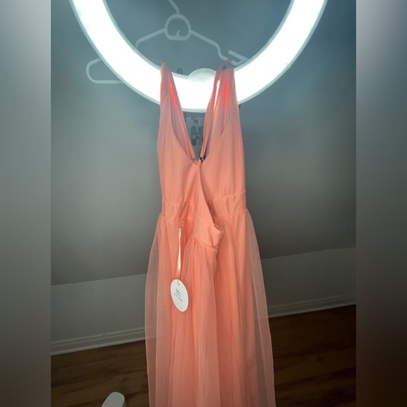 Vici Dolls
Petal Dust Maxi Dress
Apricot
Size Small - Picture 6 of 12